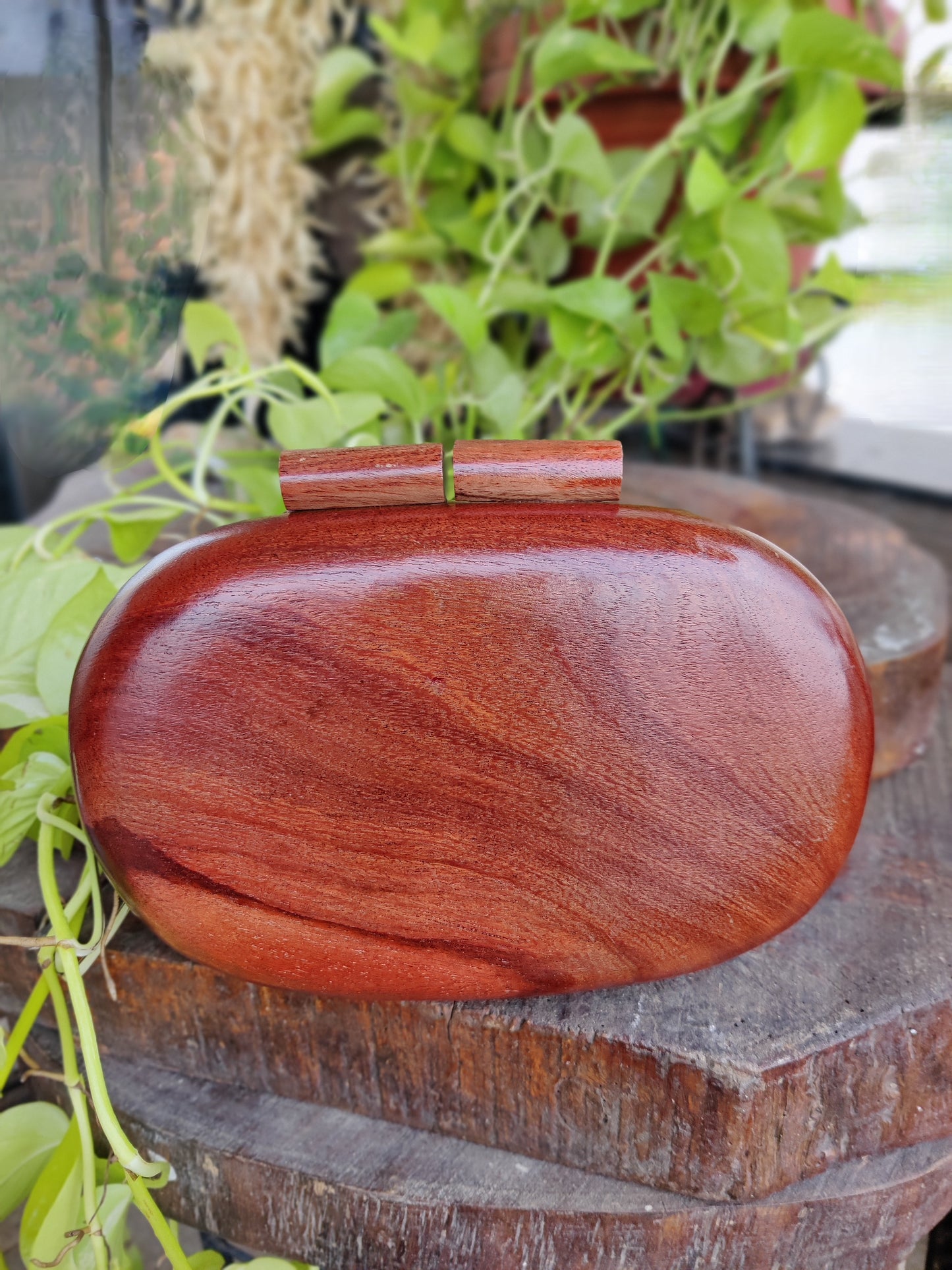 The Royals Hand Carved capsule bag in Acacia wood