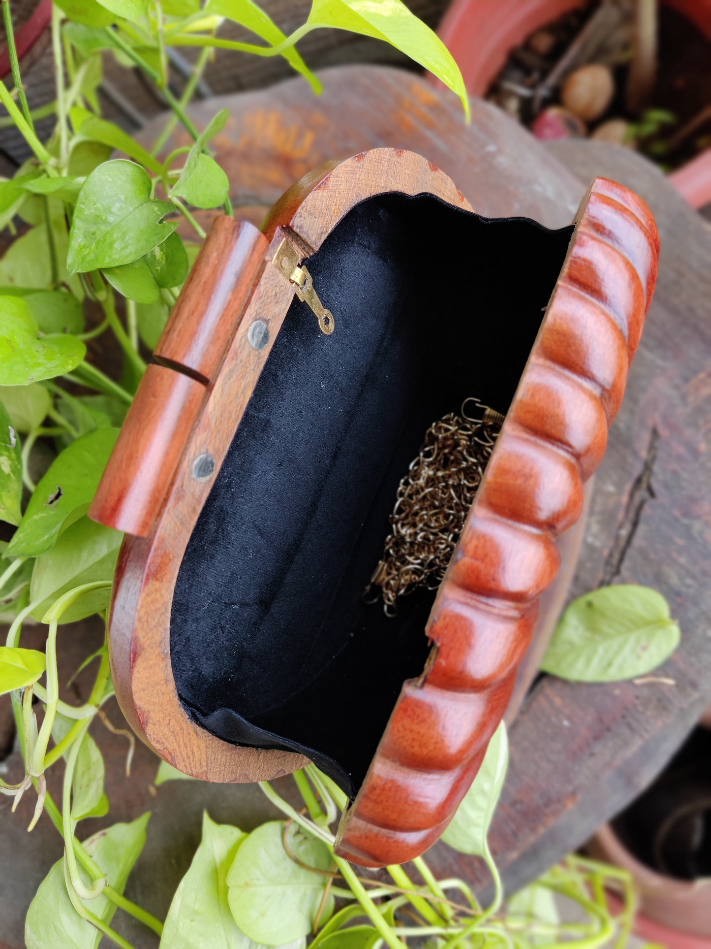 The Royals Hand Carved capsule bag in Acacia wood