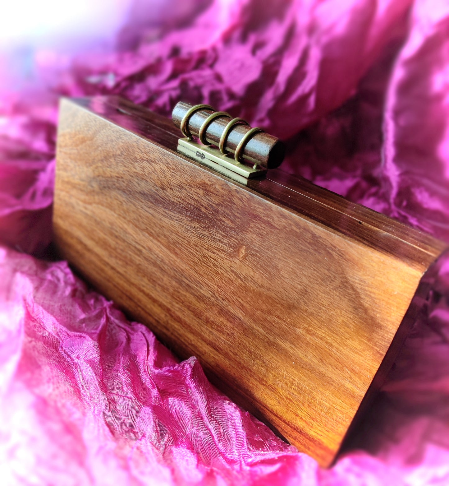 The Royal Hand carved 3D Tropical clutch in Sheesham Wood