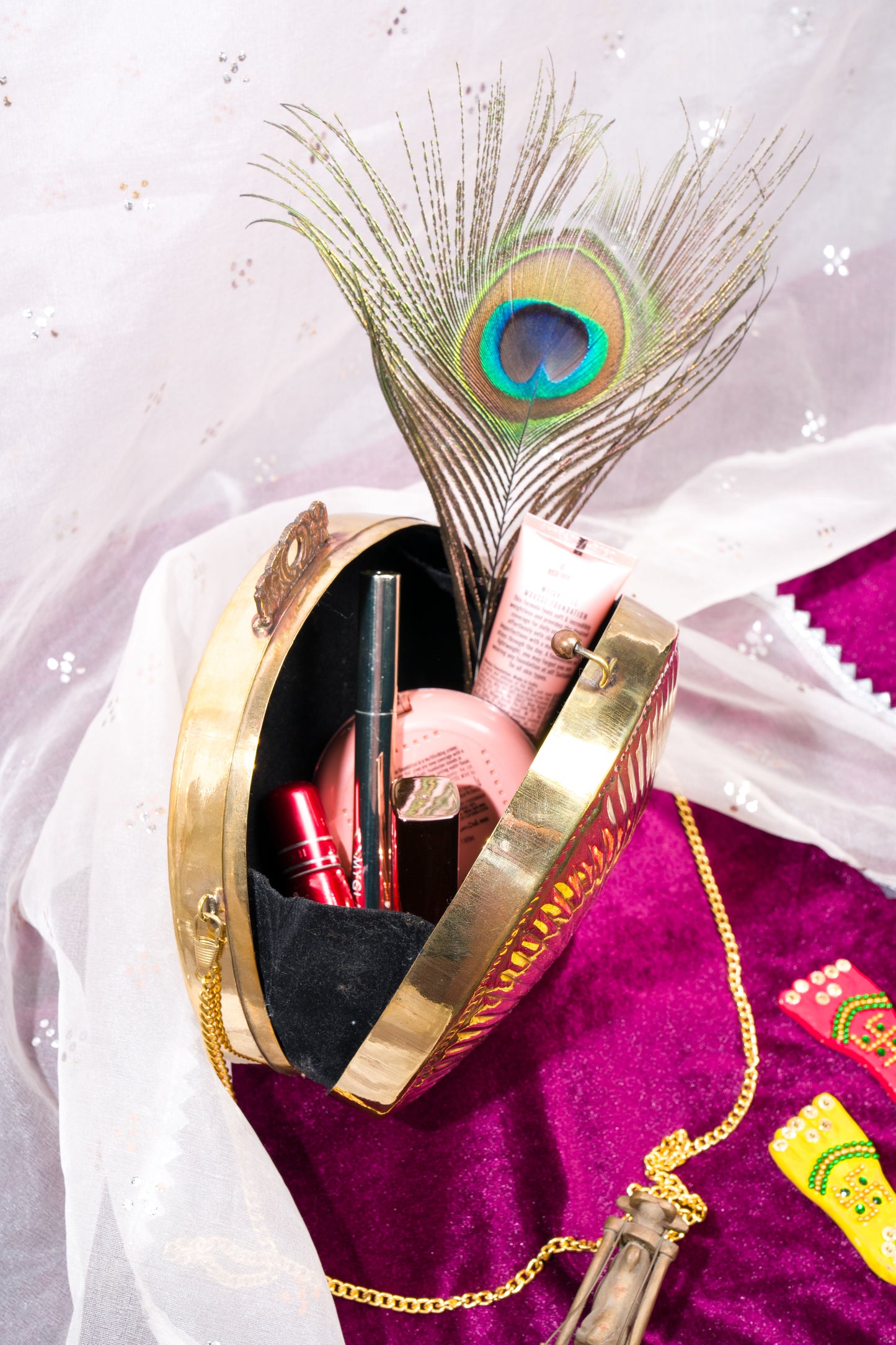 Ethnic brass bag in shell shape