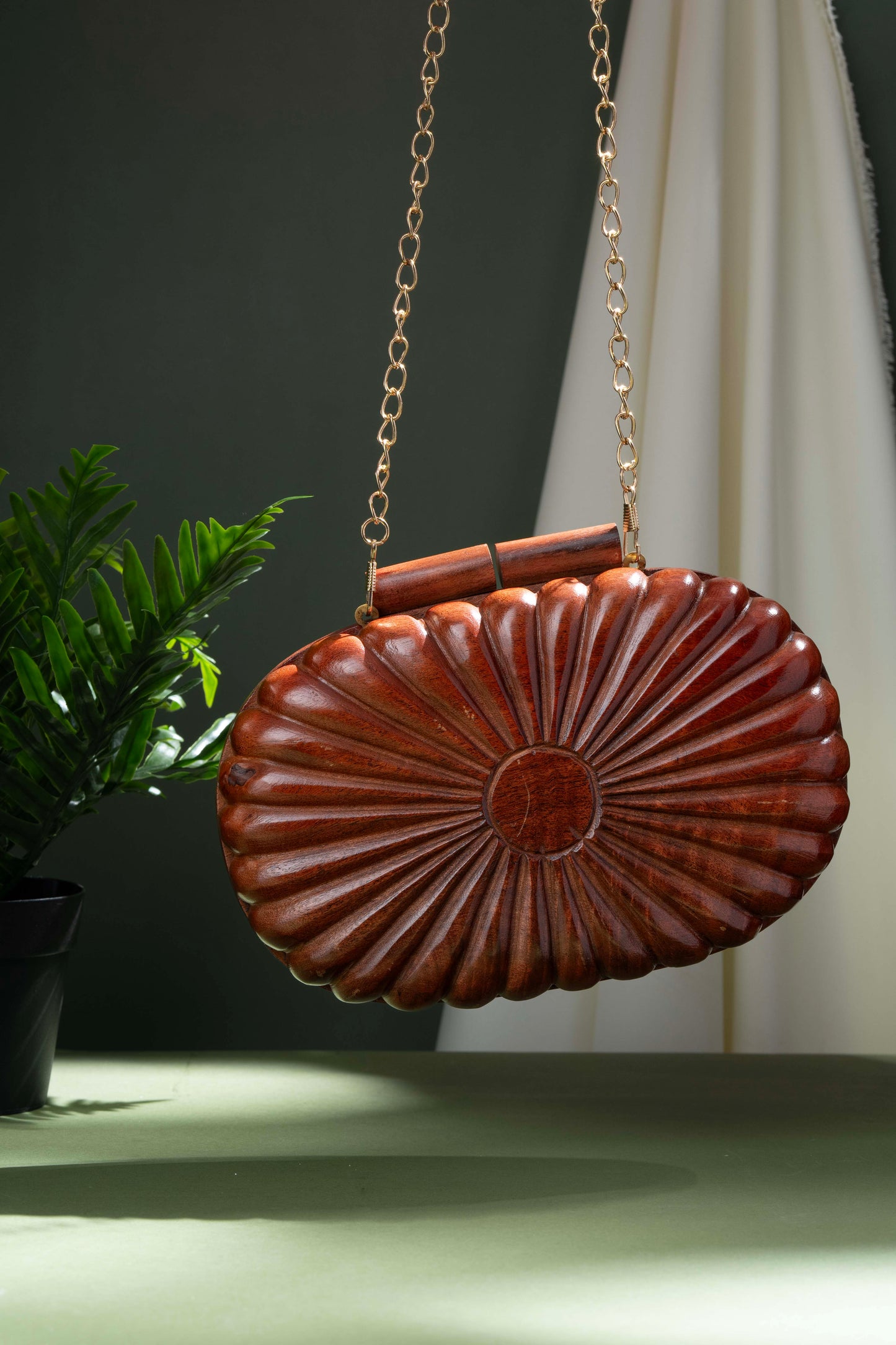 The Royals Hand Carved capsule bag in Acacia wood