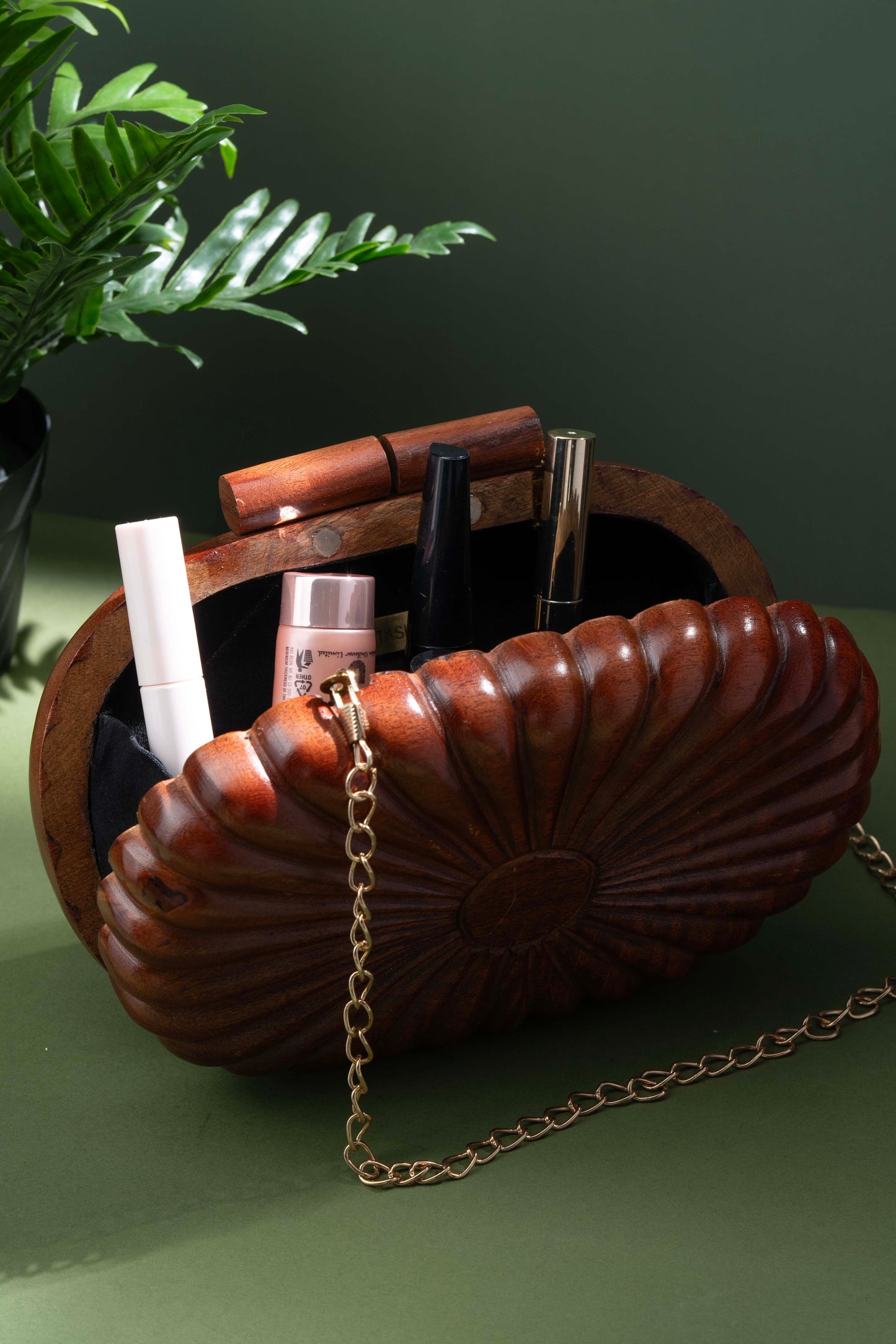 The Royals Hand Carved capsule bag in Acacia wood