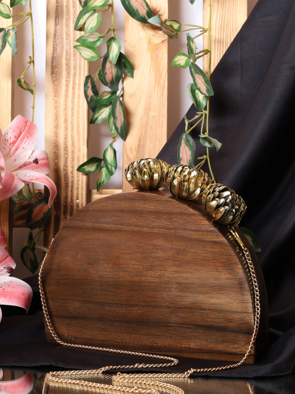 The Royal Semi Circle Bag with ornate brass floral
