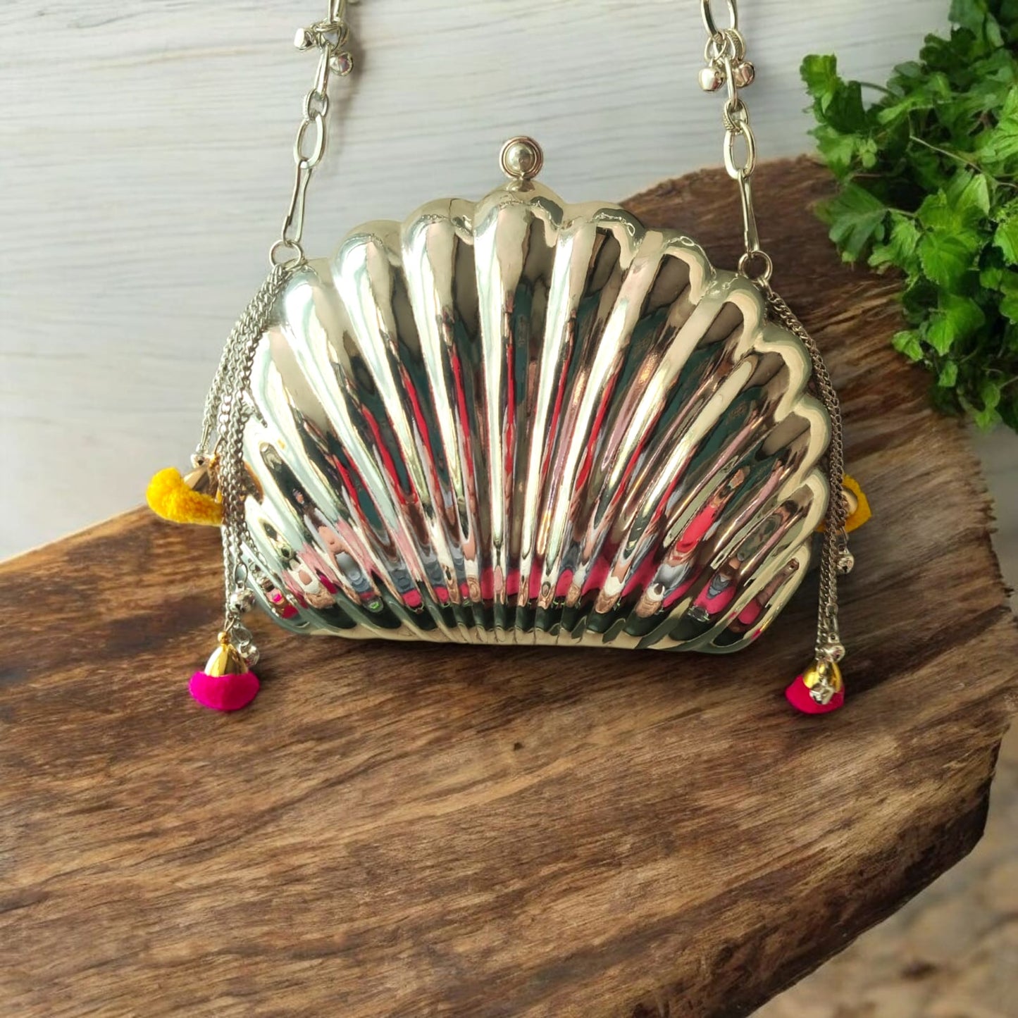 Aafreen Shell Ghungroo Brass Bag in silver finish