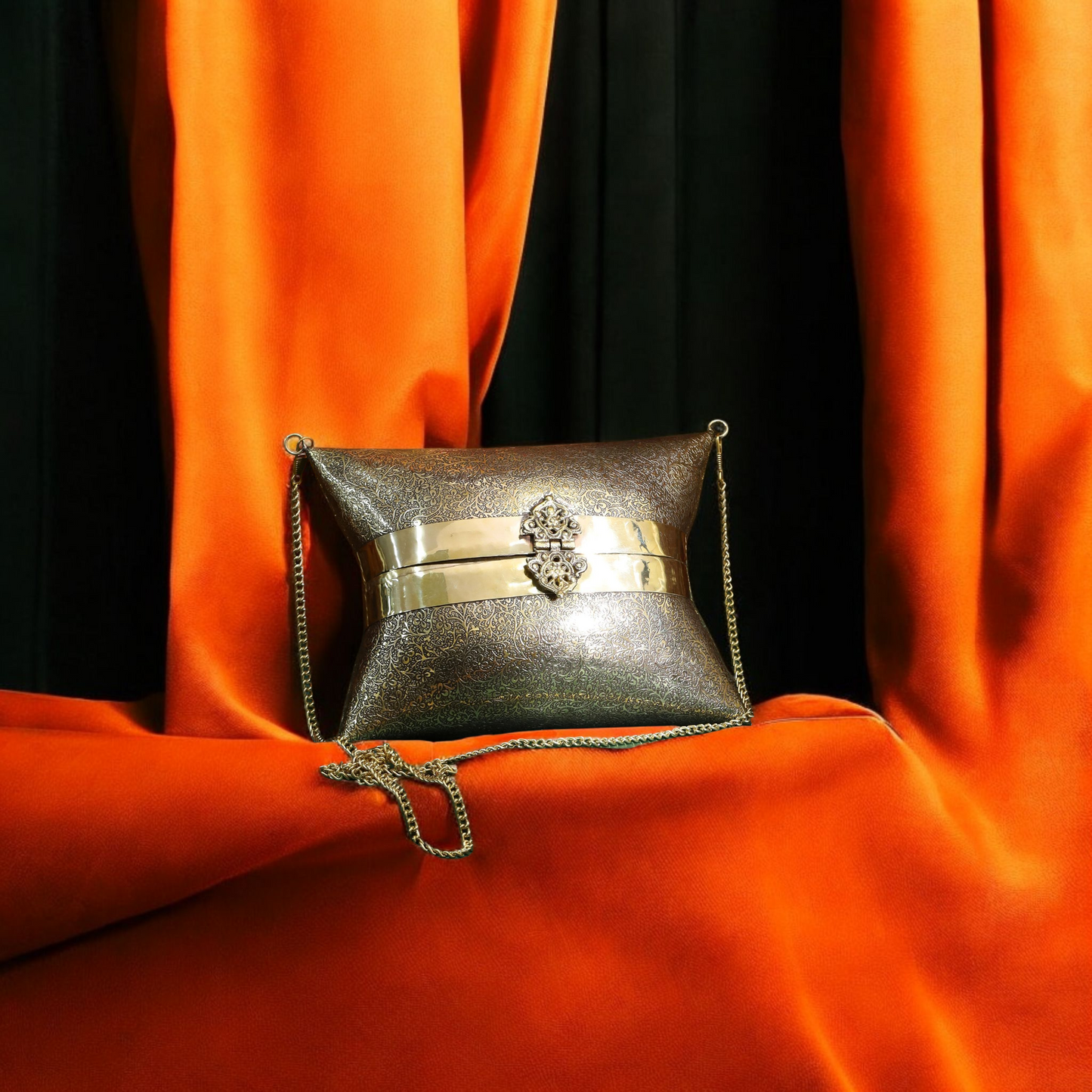 Aafreen engraved intricate pattern handbag in gold antique finish