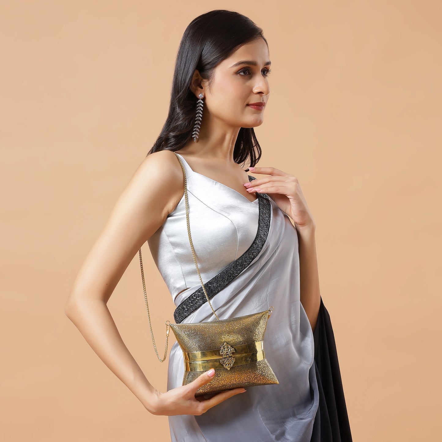 Aafreen engraved intricate pattern handbag in gold antique finish