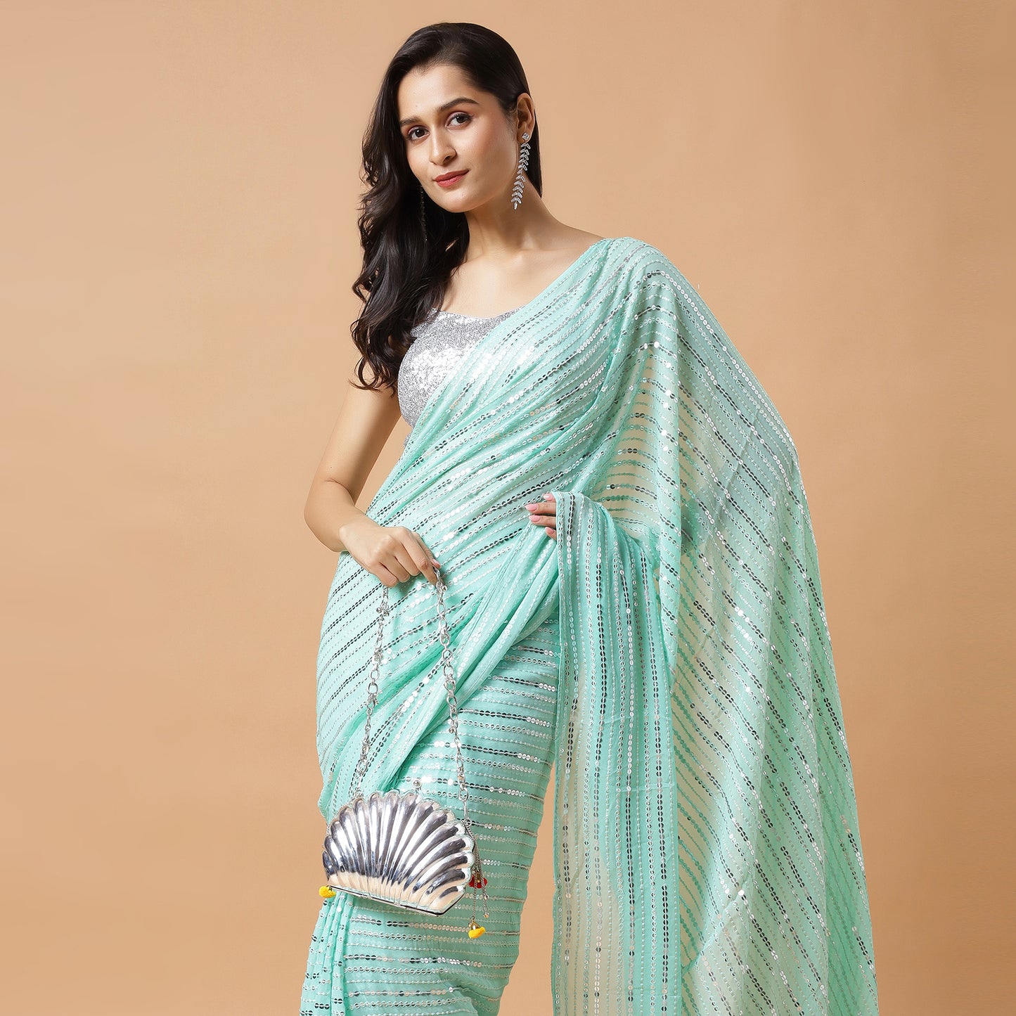 Aafreen Shell Ghungroo Brass Bag in silver finish