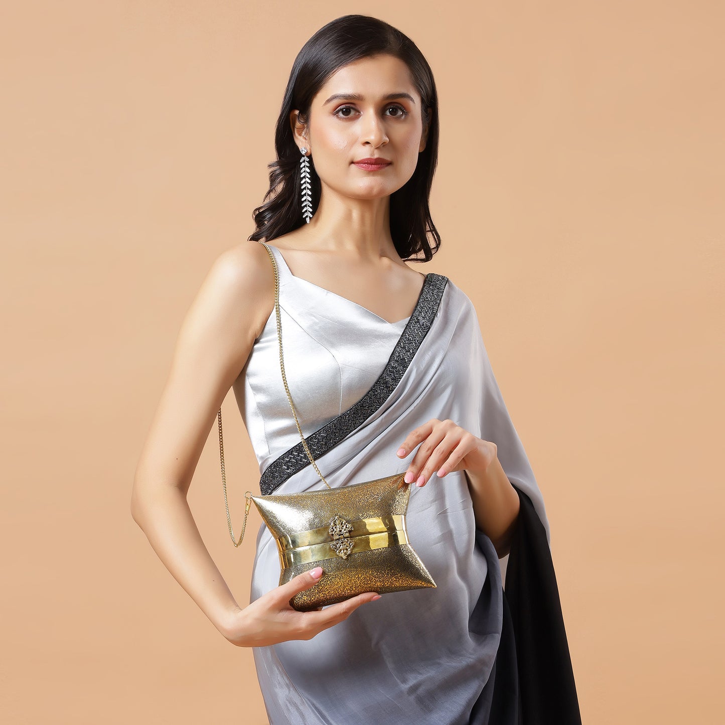 Aafreen engraved intricate pattern handbag in gold antique finish