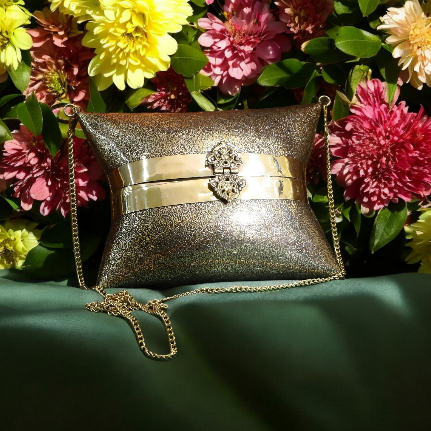 Aafreen engraved intricate pattern handbag in gold antique finish