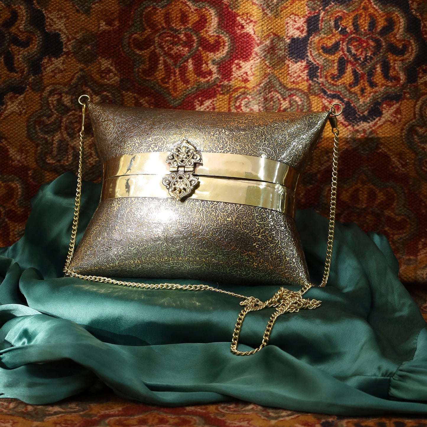 Aafreen engraved intricate pattern handbag in gold antique finish