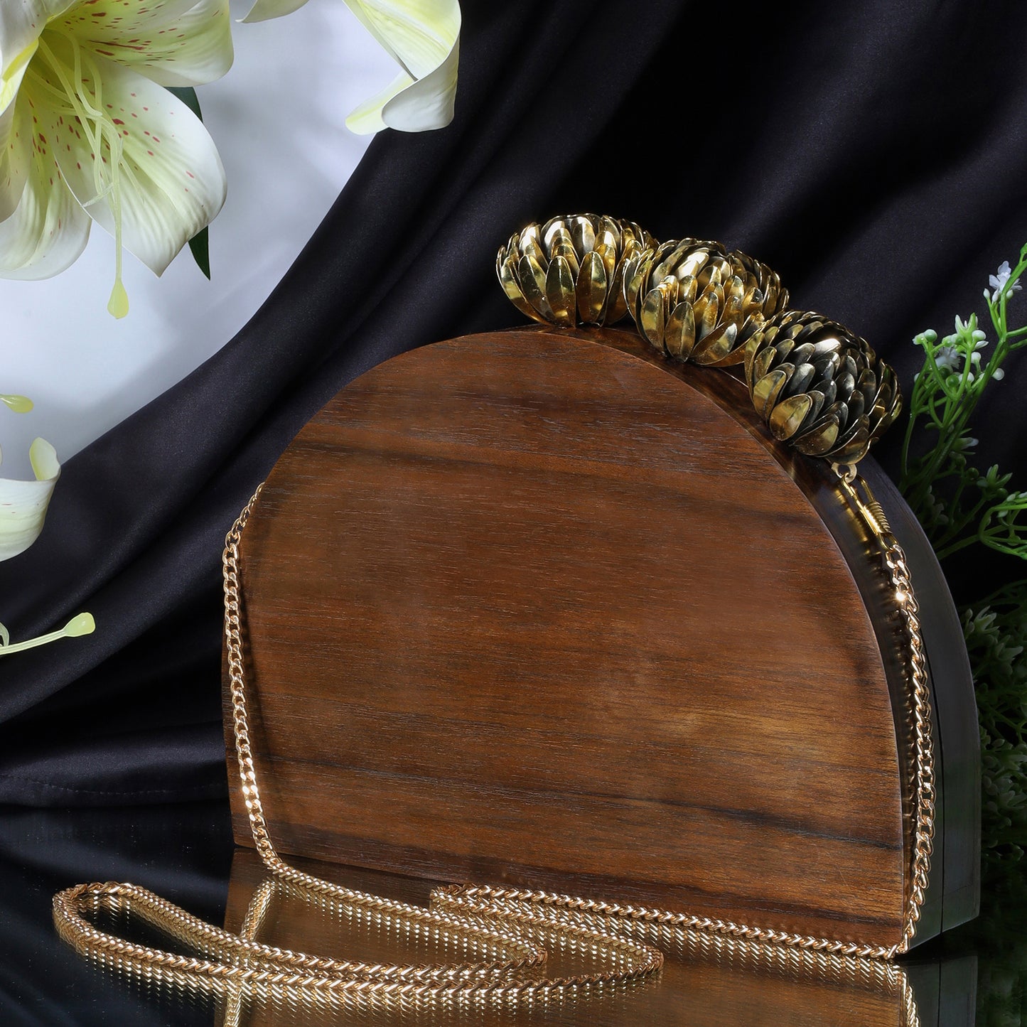 The Royal Semi Circle Bag with ornate brass floral