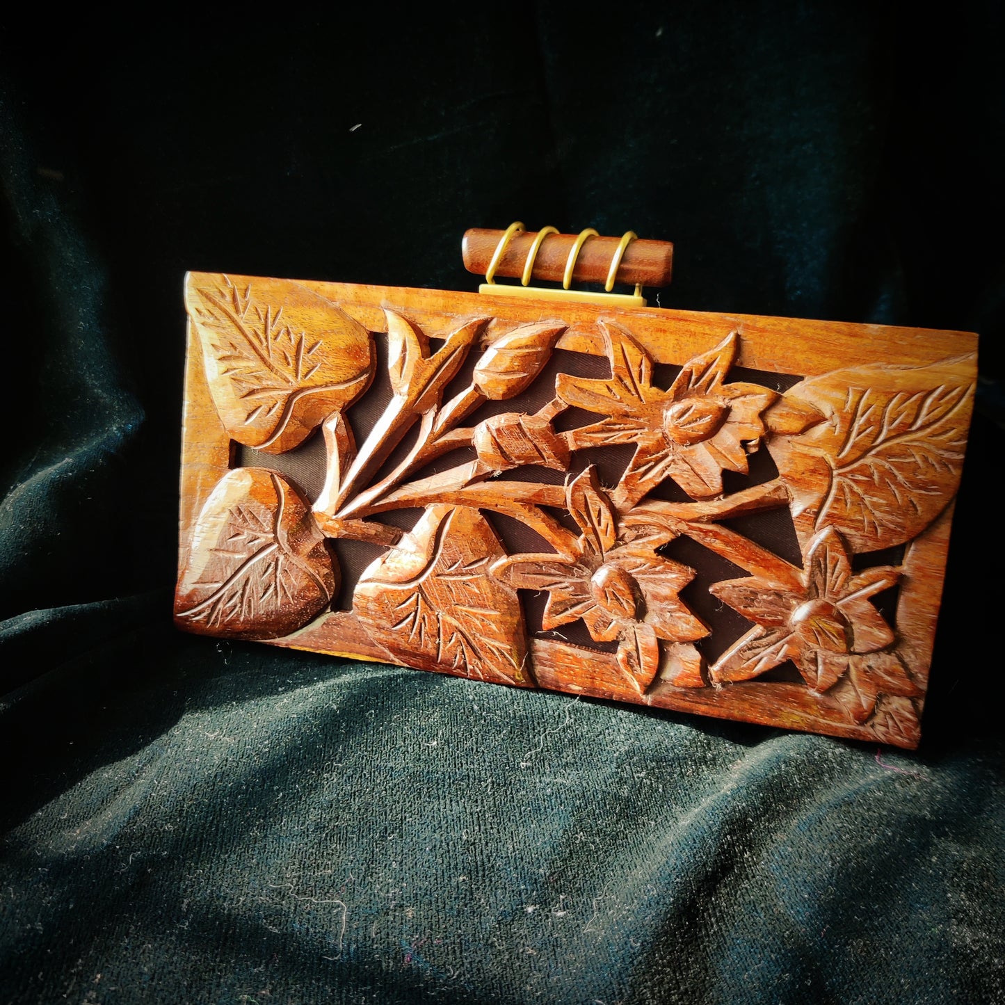 The Royal Hand carved 3D Tropical clutch in Sheesham Wood