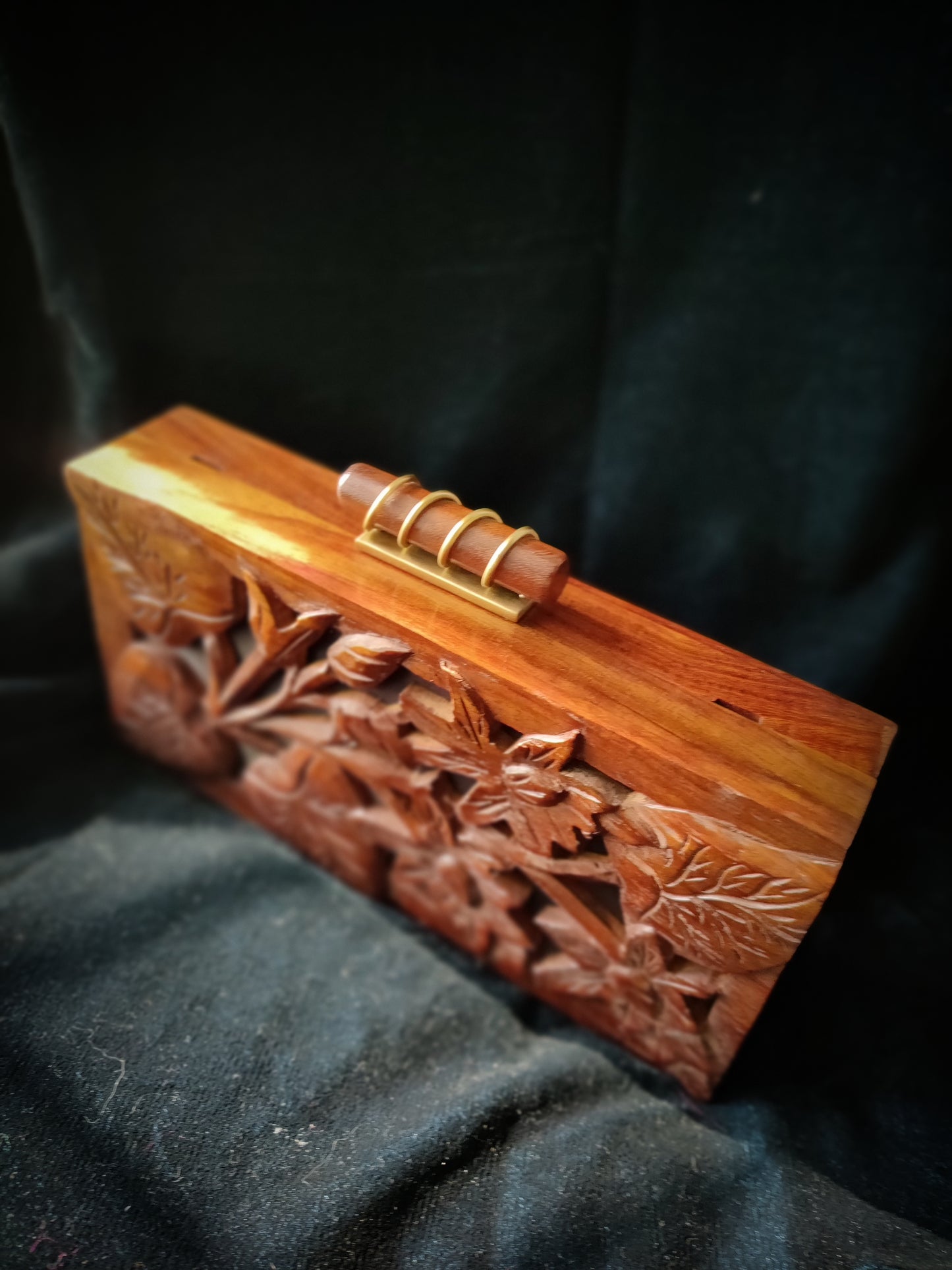 The Royal Hand carved 3D Tropical clutch in Sheesham Wood