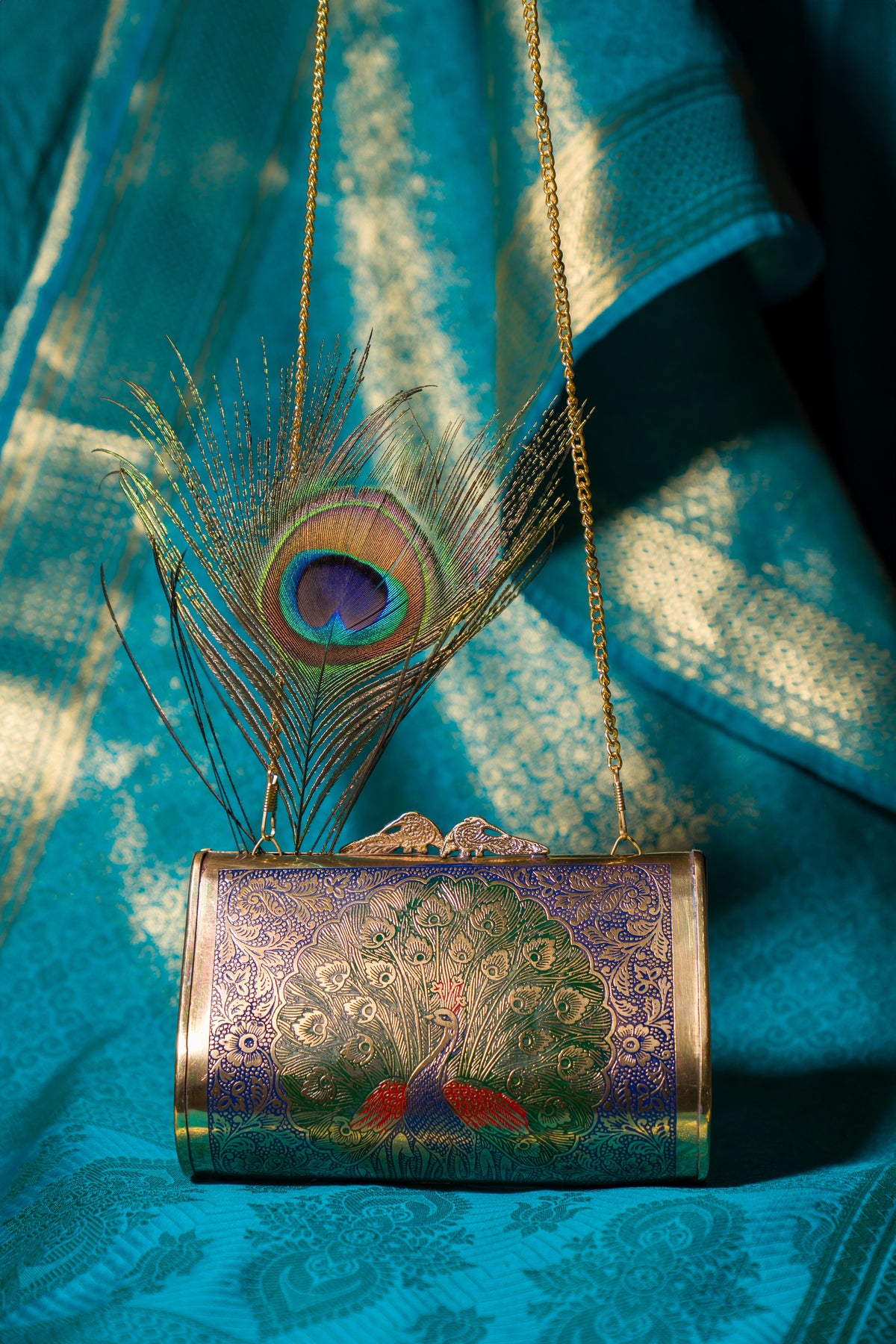 Peacock engraved vintage clutch