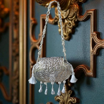 Oval Ethnic Handbag in Silver shade, tassels and ornate ghungroo sling chain