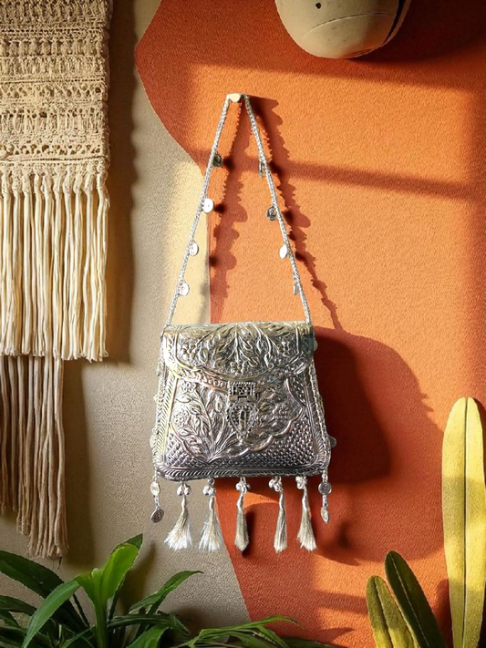 Ornate silver tassels bag with coins and ghungroo latkans
