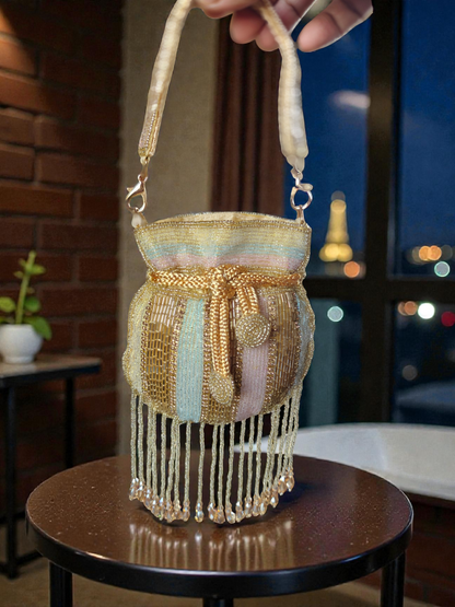 The Mini Potli Embroidered bag with crystal fringes