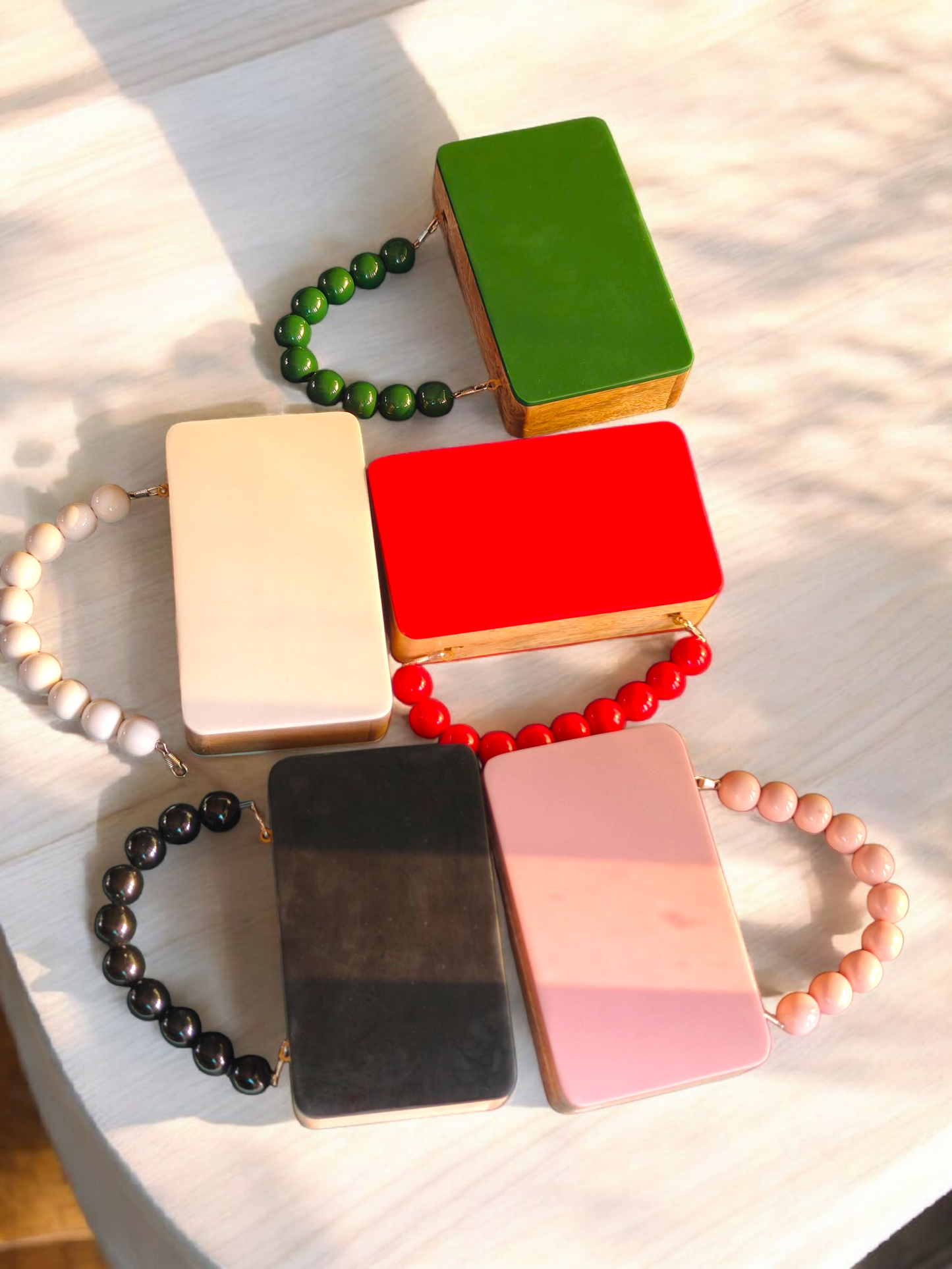 Colour blocked wooden quirky handbags