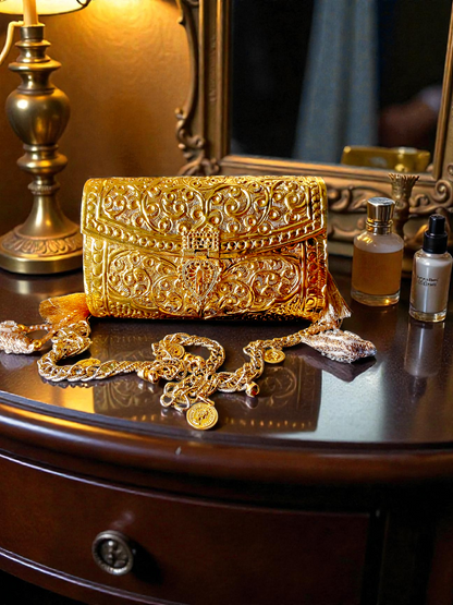 Maharani Royal intricately hand carved Brass Bag with coin and ghungroo charm chain handle