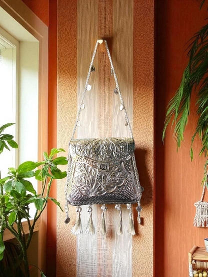 Ornate silver tassels bag with coins and ghungroo latkans