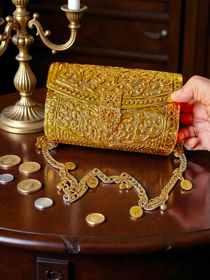 Maharani Royal intricately hand carved Brass Bag with coin and ghungroo charm chain handle
