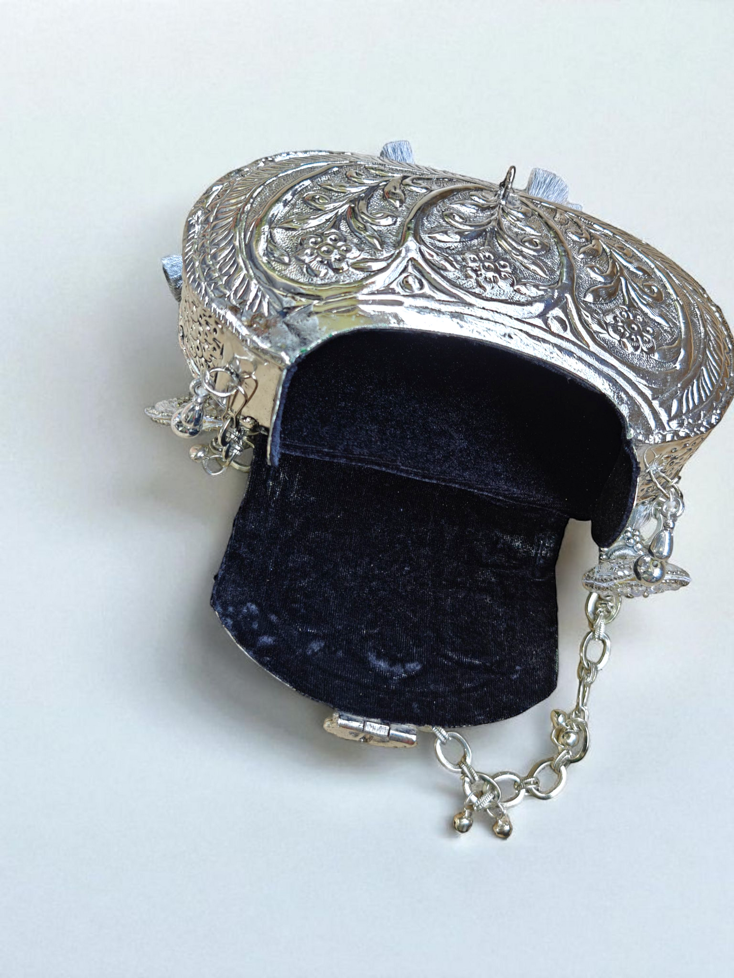 Oval Ethnic Handbag in Silver shade, tassels and ornate ghungroo sling chain