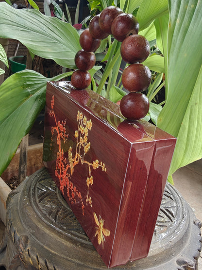 Printed wood glossy enamel handbag with beaded handle