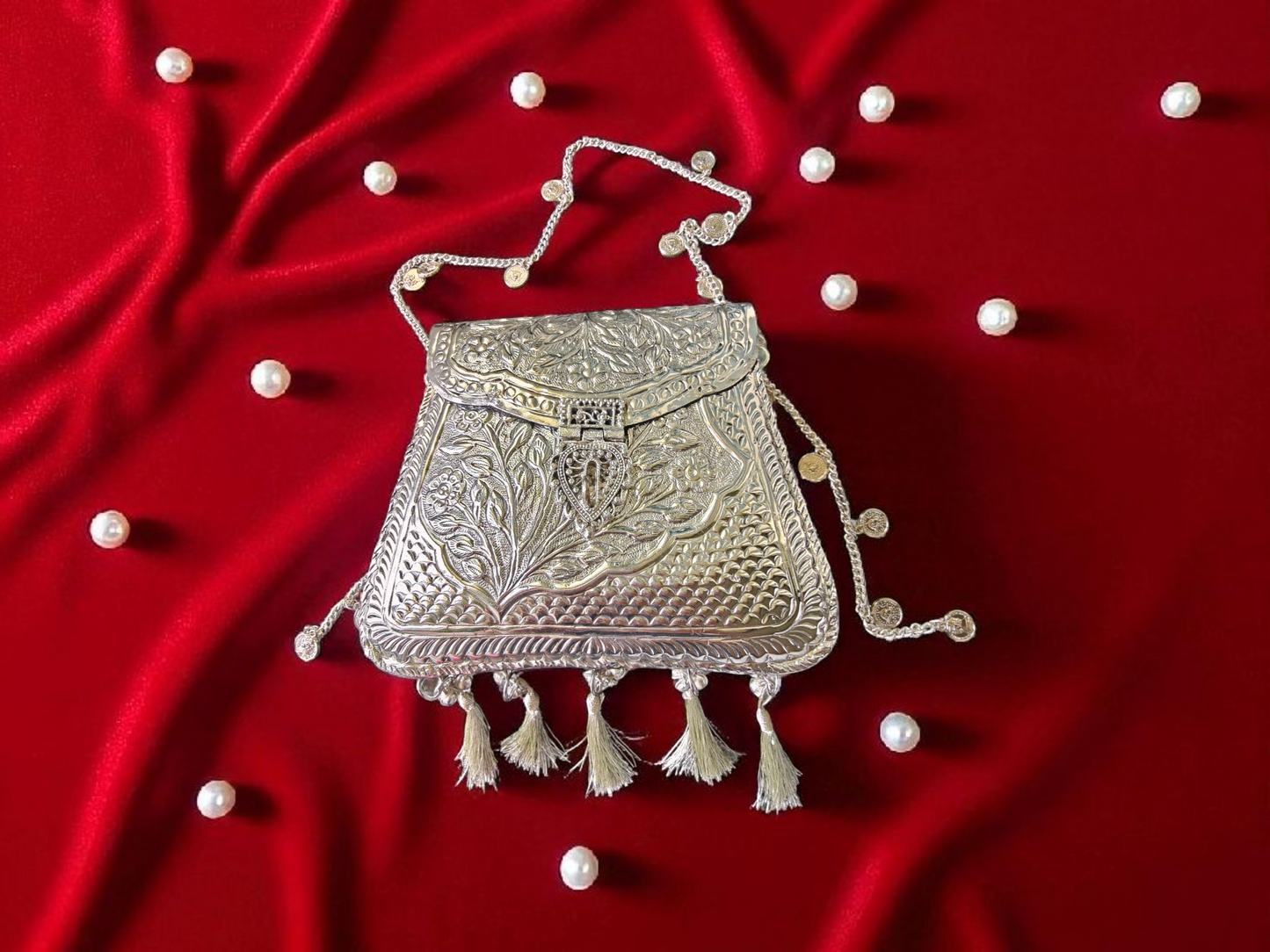 Ornate silver tassels bag with coins and ghungroo latkans