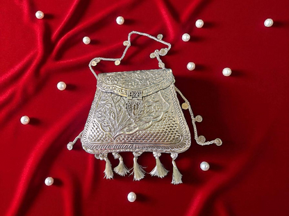 Ornate silver tassels bag with coins and ghungroo latkans